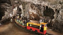 Postojna Cave and Predjama Castle from Sistiana