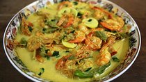 Catch fresh lake fish and cook it in a local's home in Piliyandala, Colombo