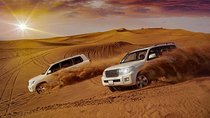 Evening Desert Safari with Camel Ride, BBQ Dinner and Dune Bashing