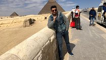 Half day with pyramids and Sphinx with riding a Camel