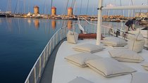 Sunset Cruise with a Swimming Stop at Kalithea Bay