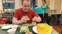 Saigon Night Street Food Tour by motorbike 