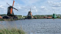 Visit Amsterdam Countryside with windmills by bike