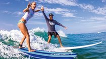 Surf with ALOHA SURF SCHOOL