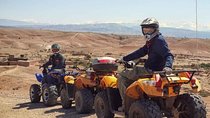 Quad biking in the road to the dam in Marrakech