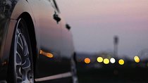 Full day luxury car with driver at disposal in Zurich