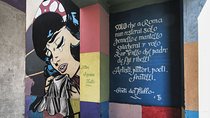 Trullo Photo Tour: popular art and poetry on the walls of a neighborhood
