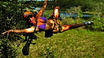Adrenaline day driving ATV’s doing Ziplines and swimming in a Cenote from Cancun