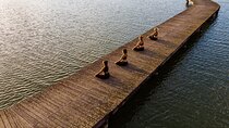 Relax and nature: Yoga lesson on the shore of the lake with picnic