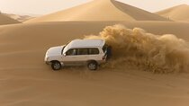 Morning Desert Safari plus Quad Bike, Sandboard and Camel ride