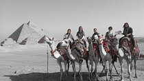 Full DAY TOUR TO GIZA PYRAMIDS WITH CAMEL RIDE AND EGYPTIAN MUSEUM IN CAIRO