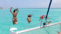 Catamaran Sailing through gorgeous waters of the Caribbean Sea to Isla Mujeres 