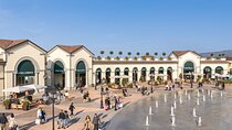 From Lake Como or Milan: Serravalle VIP shopping and Wine Tasting