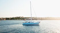 Private Catamaran Day Sailtrip from Rhodes to Tsampika Beach via Anthony Quinn