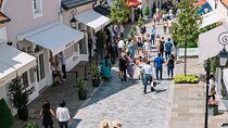 Marais with Seine River Cruise and la Vallée Village shopping tour