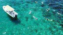 Boat ride to the Arch and Snorkel