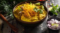 Thai Cooking Class and Visit to the Local Market with your English-speaking guide