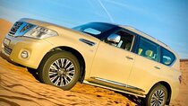 VIP Desert Safari with Dune Bashing Sandboarding Quad bike and BBQ Dinner