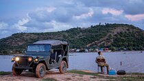 Countryside and sunset with Military Jeep