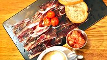 Iberian ham experience with traditional breakfast in center Madrid
