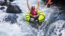 Guachipelin Zipline, River Tubing, Horseback Ride, Hot springs & Lunch Combo 