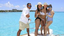 Sailing to Isla Mujeres via Luxury Catamaran with premium Open Bar