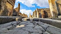 Transfer Naples airport/station to Sorrento with stop in Pompeii