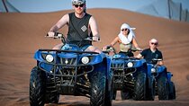 Red Dune Desert Safari with Dinner Quad Bike and Camel Ride