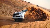 Desert Safari with BBQ Dinner and Camel Ride 