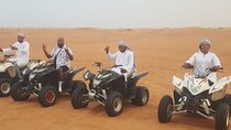 Quad Bike Dubai Desert Safari with BBQ Dinner Sandboard and Show