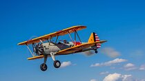 Historical Flight Adventure in an Open Cockpit Biplane From WWII 