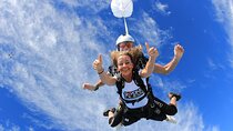 Morning Sky Dive and Evening Global Village Visit with Transfer