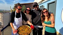 Traditional Valencian paella, cooked with orange wood.