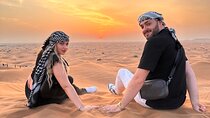 Sunrise Desert safari With Quad bike ride Sandboard & Camel ride