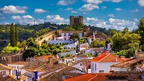 Transfer from Lisbon - Porto (Stopping in Óbidos, Nazaré and Aveiro)