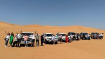 Abu Dhabi: 7-Hours Desert Safari with BBQ, Camel Ride & Sandboarding