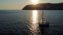 Sunset sailing along the cliffs of Maro- Private