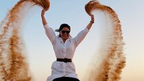 Morning Red Dune Safari with Sandboarding and Camel Ride
