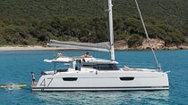 Mykonos: Luxury Catamaran Cruise with Meal, Drinks & Transport