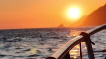Aperitif on a boat at sunset, Porto Venere and islands