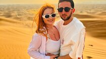 Dubai Dune Bashing Tour with Quad Bike, Sandboarding, Camel Ride