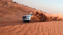 Evening Desert Adventure: Quad Biking, Sandboarding & Camel Ride
