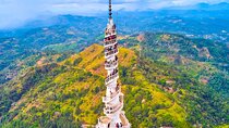 Peradeniya Garden, Ambuluwawa and Pinnawala Day Tour from Kandy