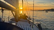 Sunset sailboat tour in Lisbon with wine and beer