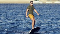 Thrilling E-Foil surfing above the waves of Muscat
