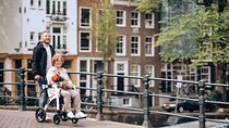 Professional Photoshoot at Damrak: Amsterdam’s Iconic Waterfront
