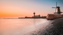 Private transfer: Amsterdam to Vlissingen, 2h stop in Rotterdam