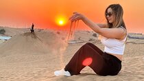 Red Dune Desert Safari with Camel Riding Sand Boarding BBQ Dinner