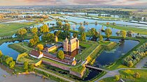 Private transfer: Amsterdam to Kinderdijk, 2h Stop at Loevestein