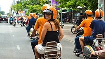 Saigon Sightseeing Day Tour by Motorbike: Chinatown Flower Market